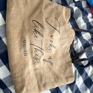 Beige Tote Bag with Black Text